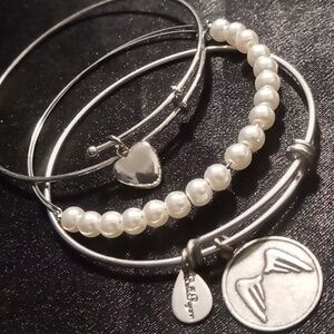 Bella Ryann bangle bracelet angel wings & heart pendant bracelet.